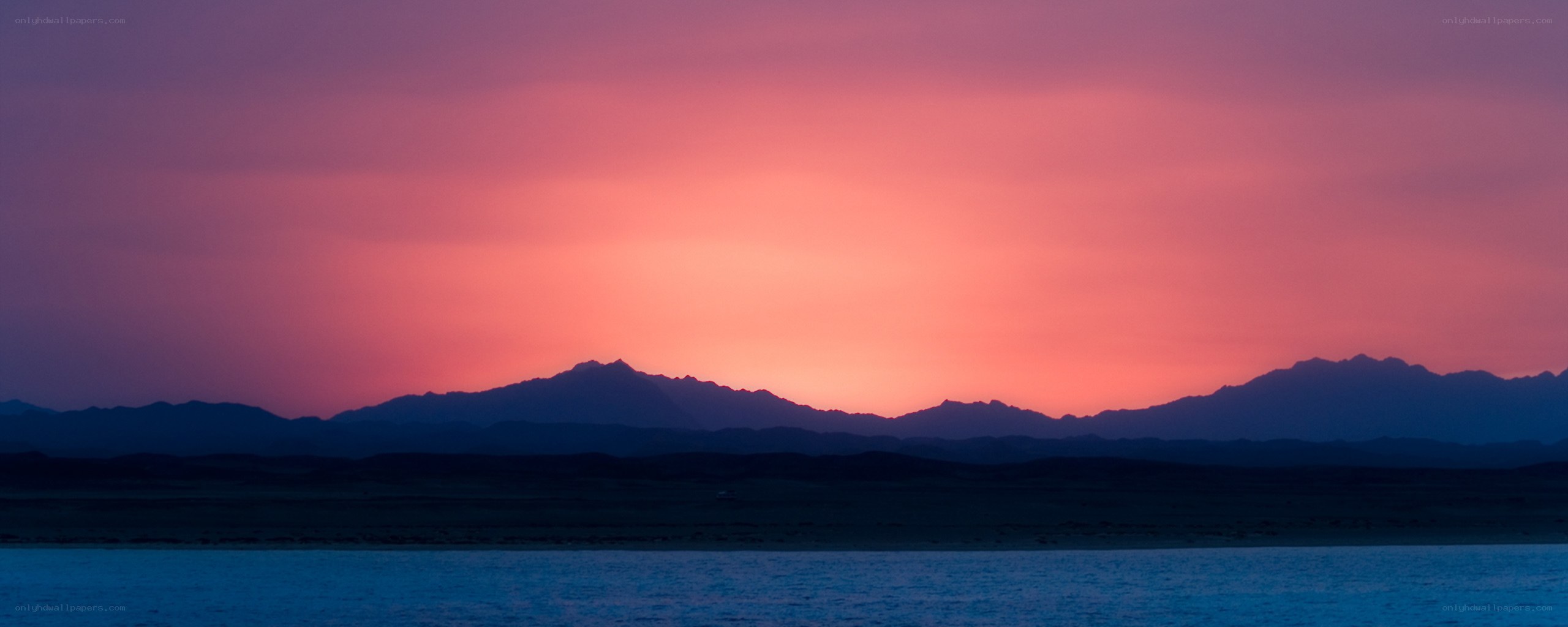 Sunset over mountain lake
