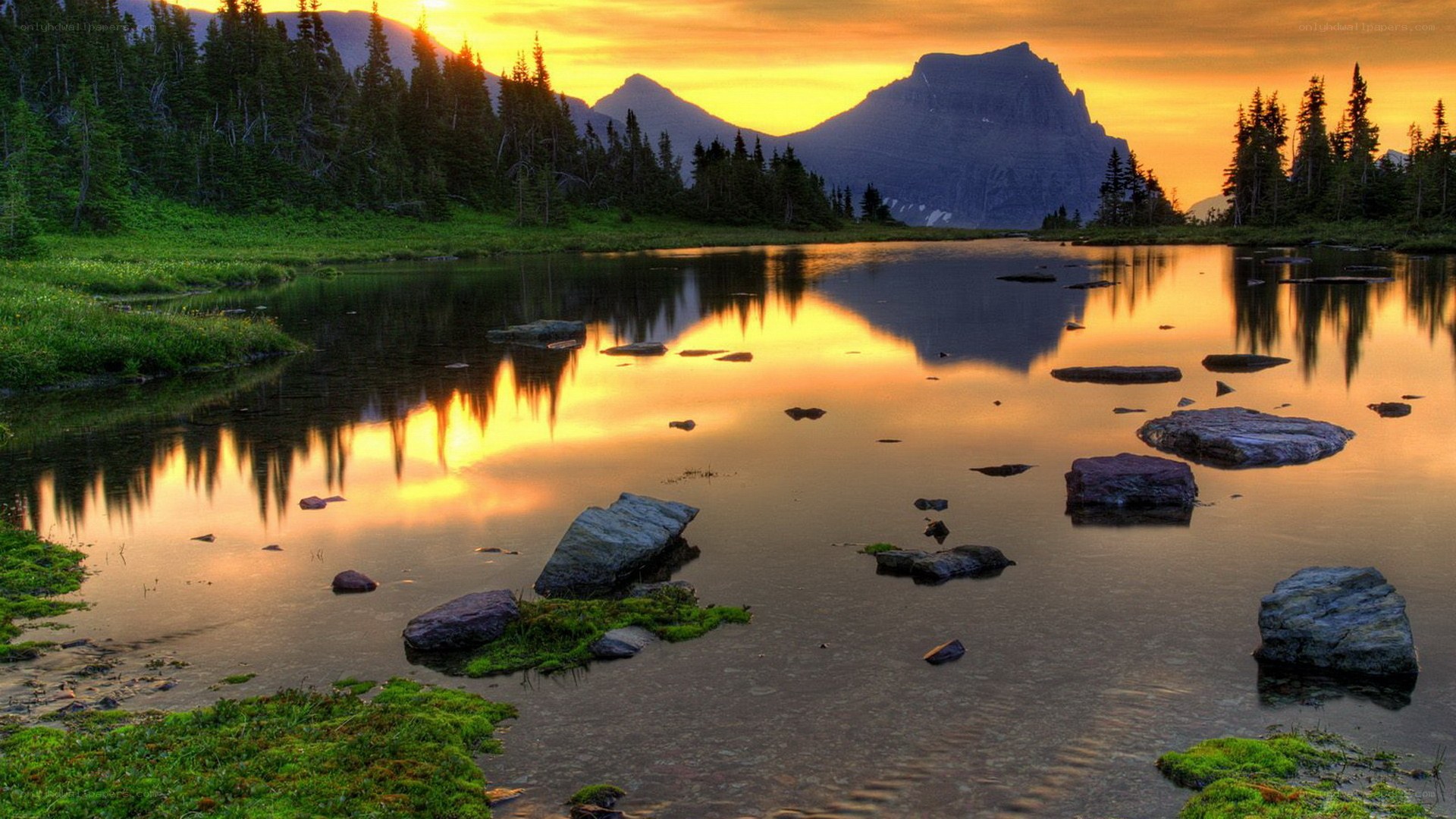 Sunset over mountain lake