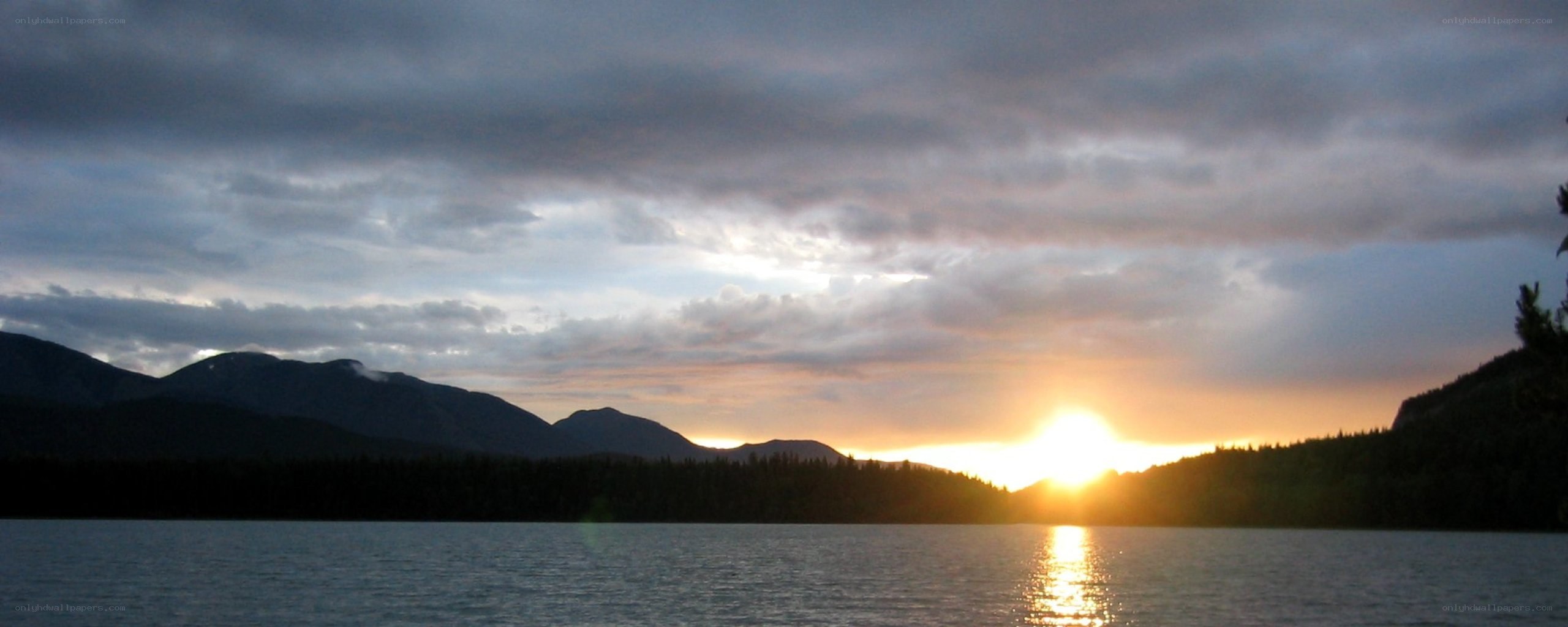 Sunset over mountain lake