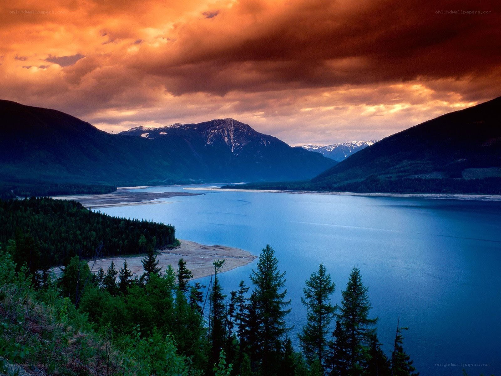 Sunset over mountain lake