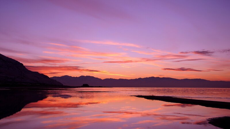 sunset over mountain lake
