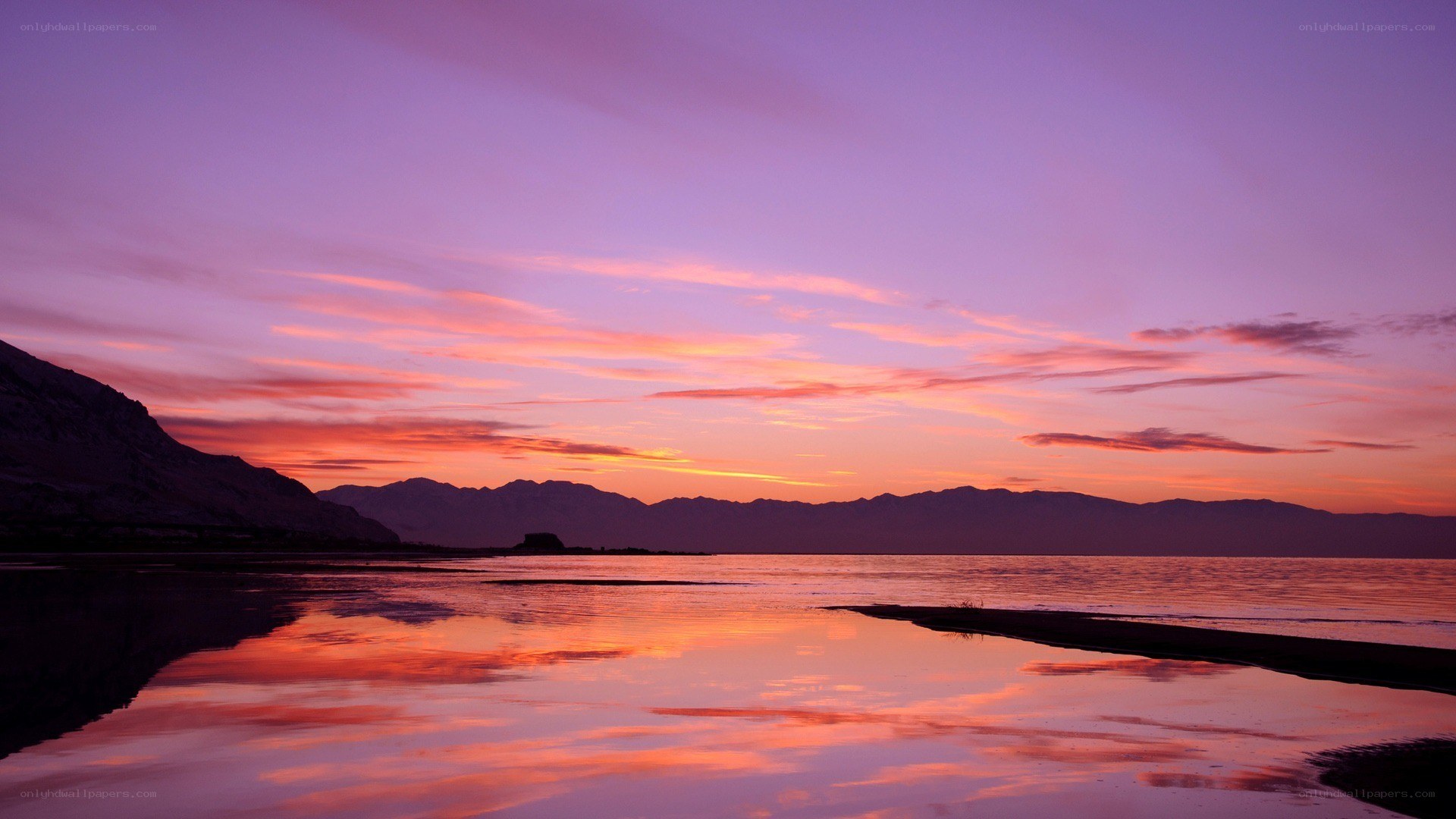 sunset over mountain lake
