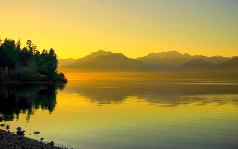 Sunset over mountain lake