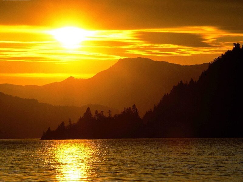 Sunset over mountain lake