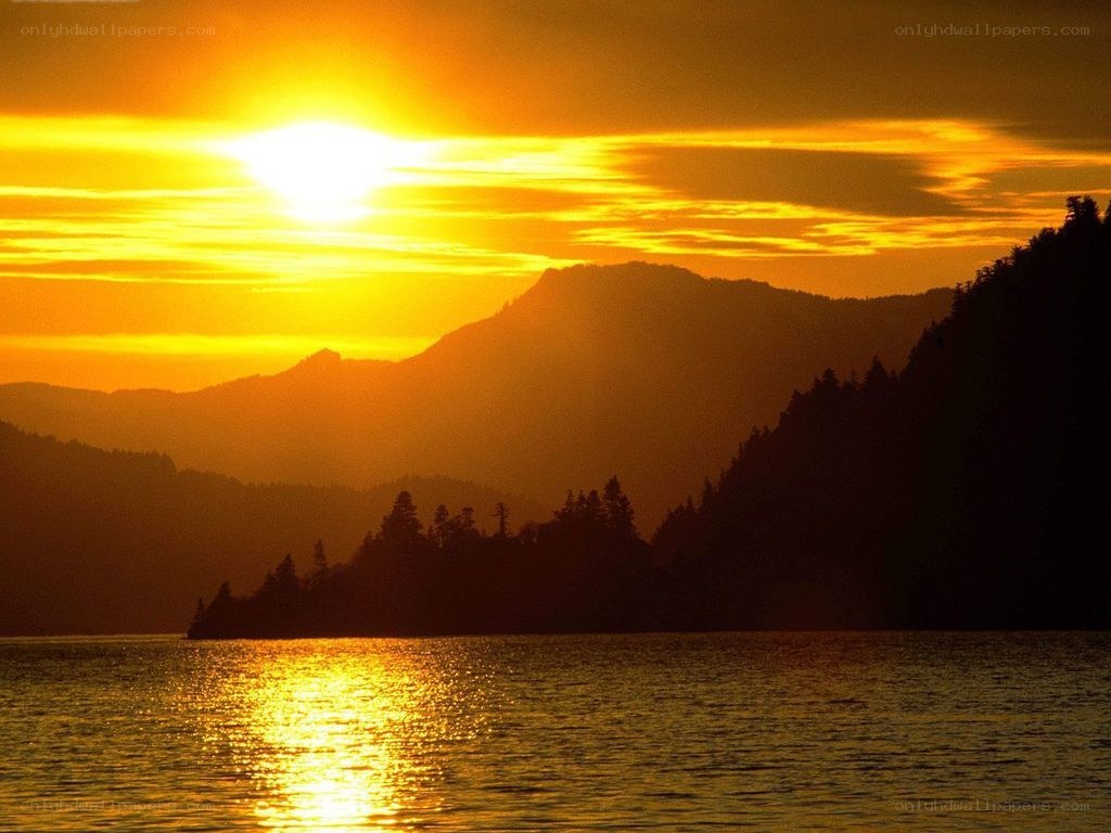 Sunset over mountain lake