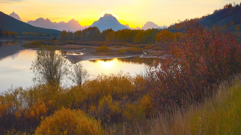 Sunset over mountain lake