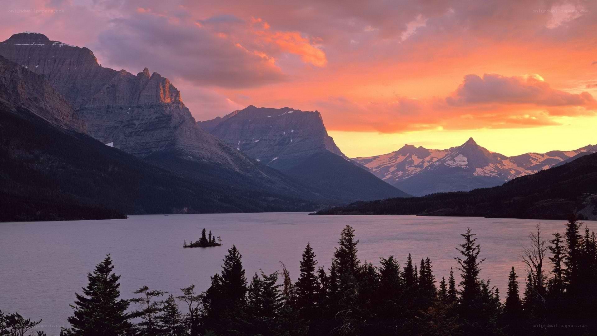 sunset over mountain lake