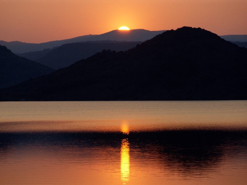 Sunset over mountain lake