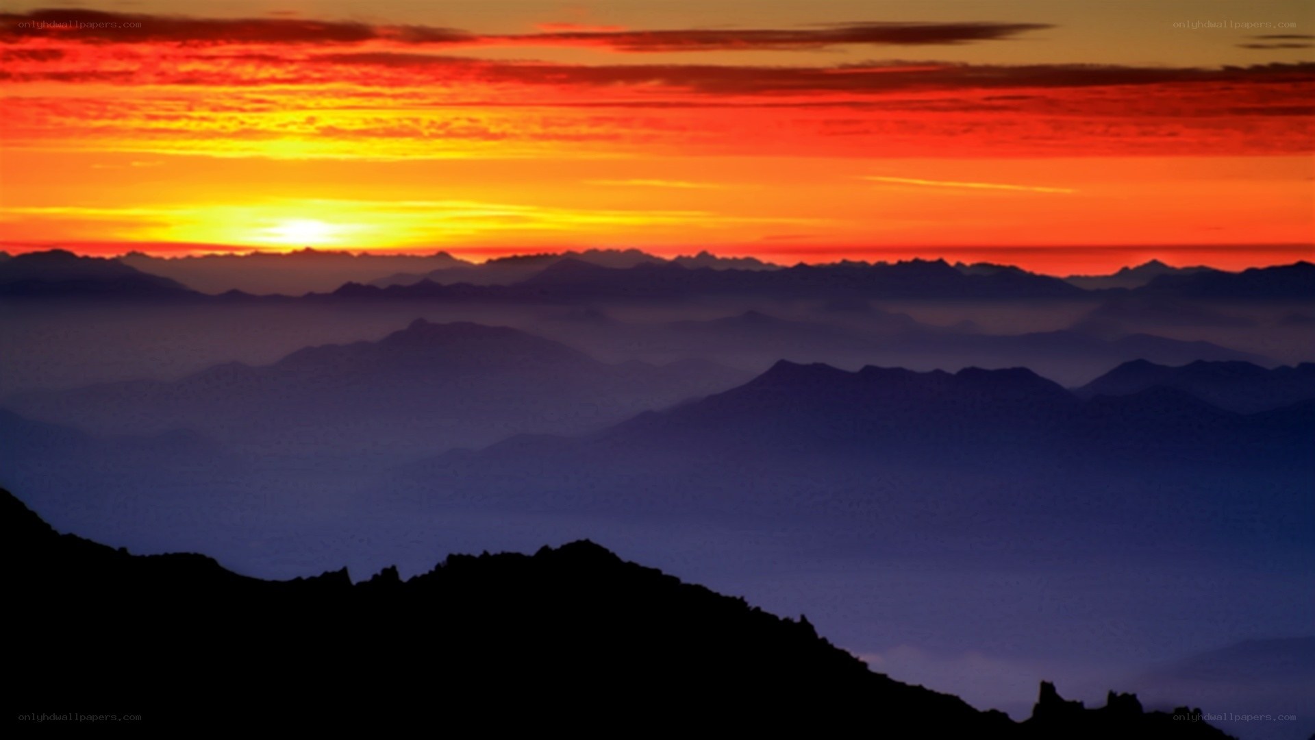 Sunset over mountain layers