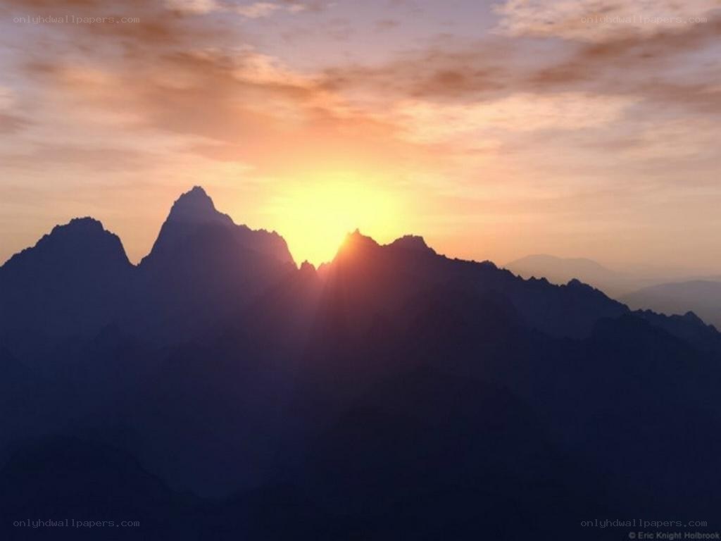 Sunset over mountain peaks