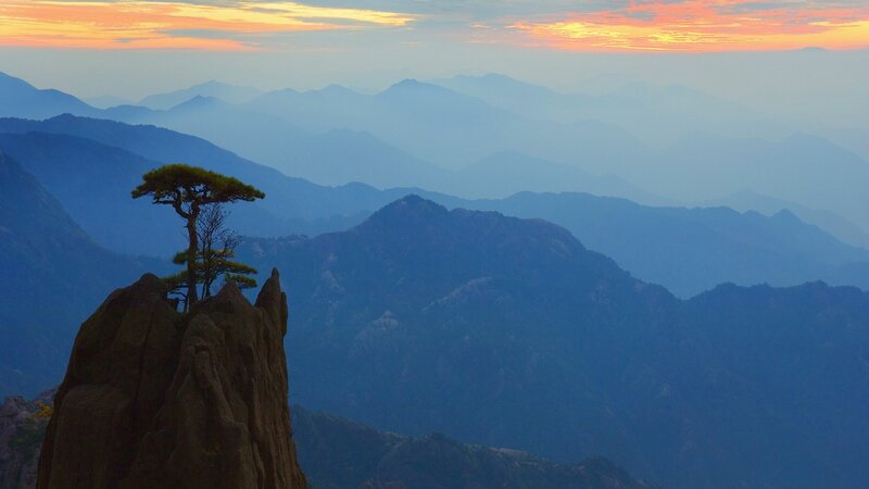 Sunset over mountain peaks