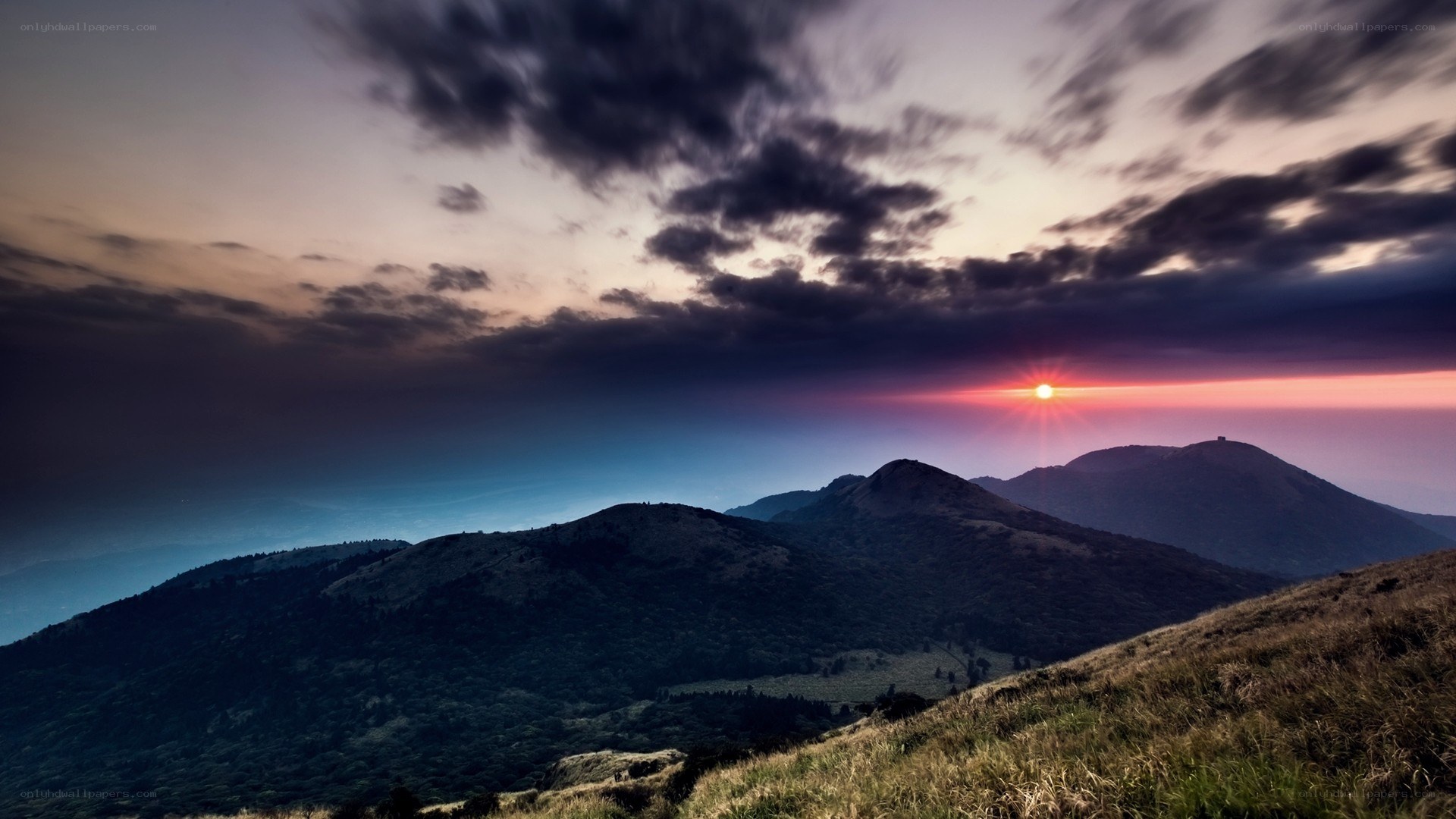 Sunset over mountain peaks