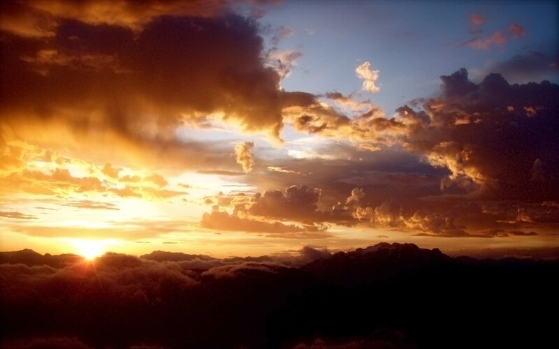 Sunset over Mountain Peaks — Orange