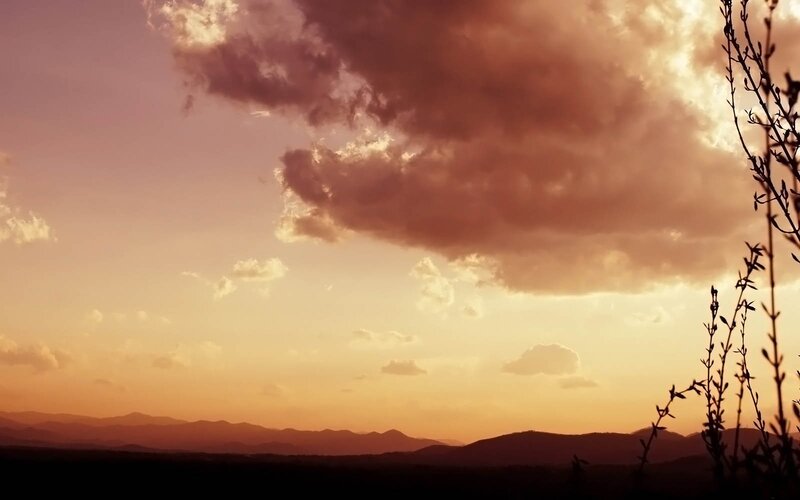 sunset over mountain range