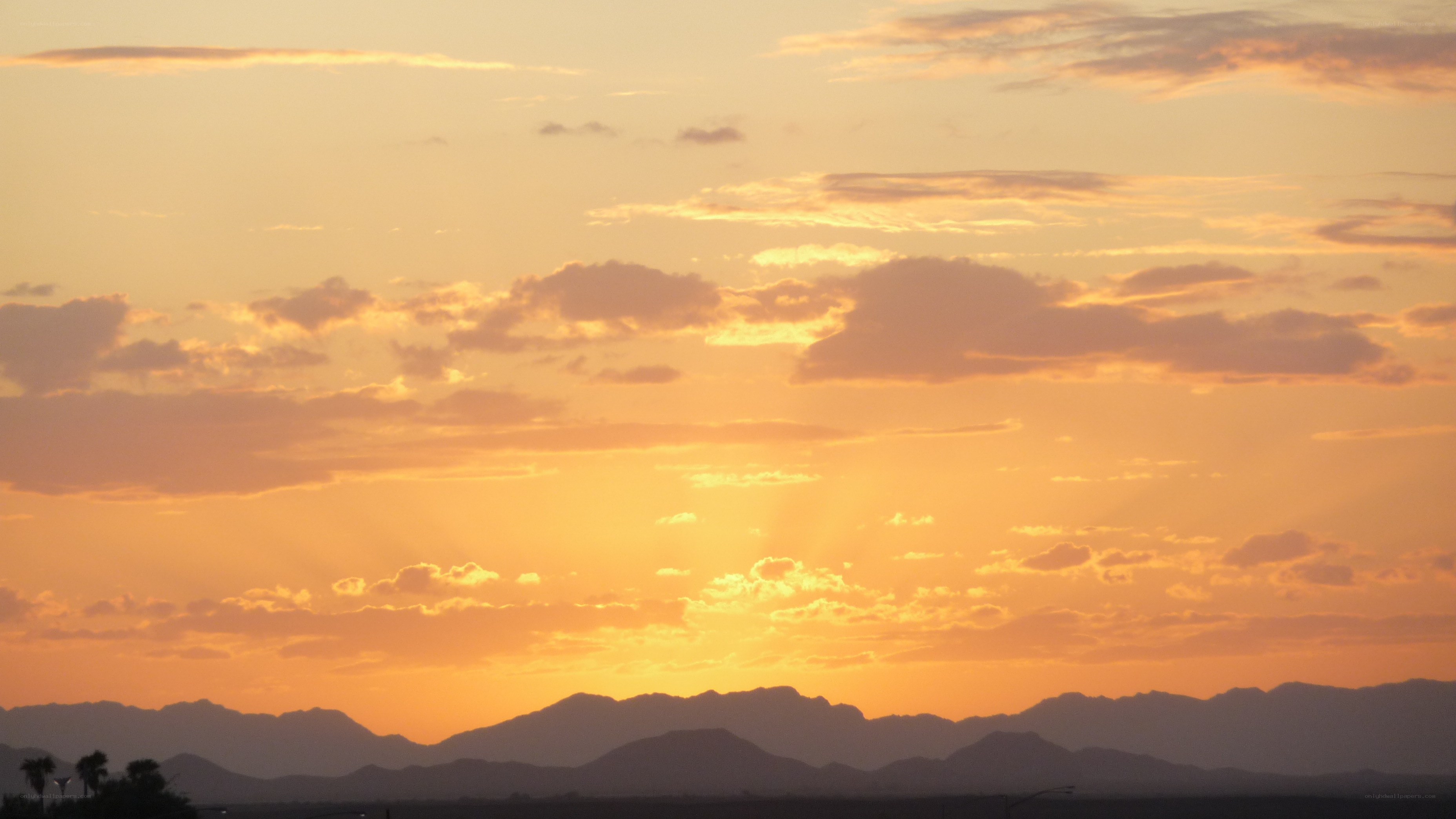 sunset over mountain range