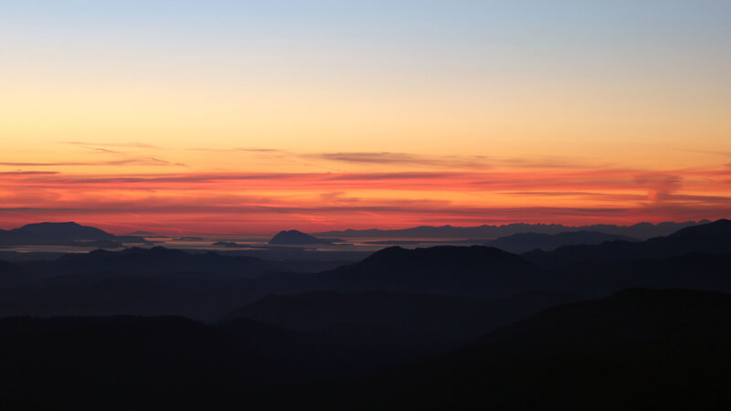 sunset over mountain ranges
