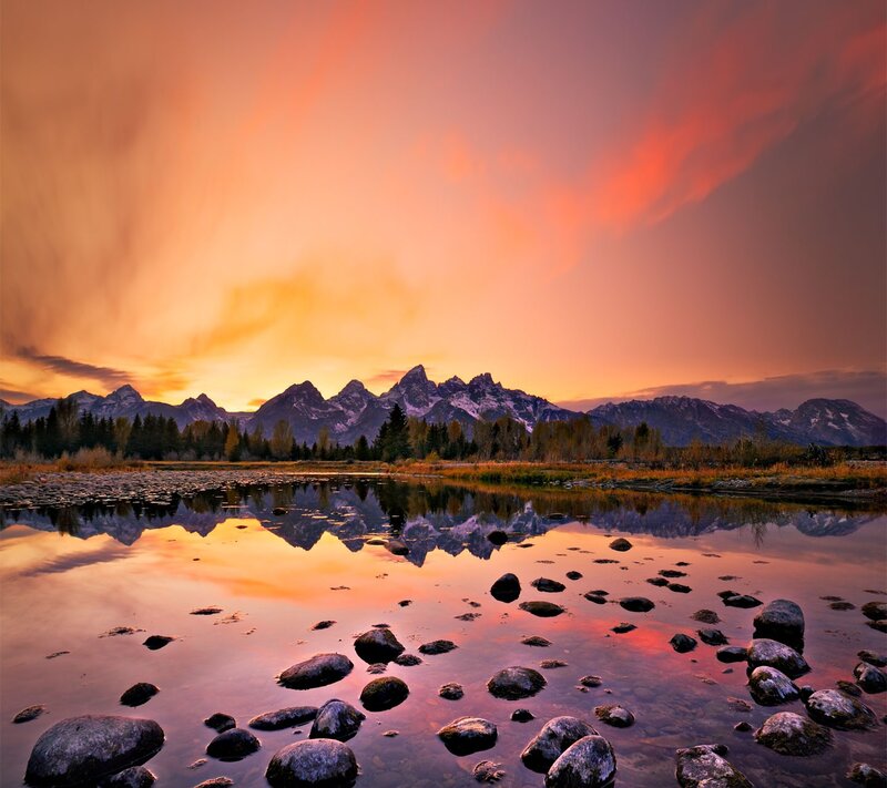 Sunset over mountain reflection