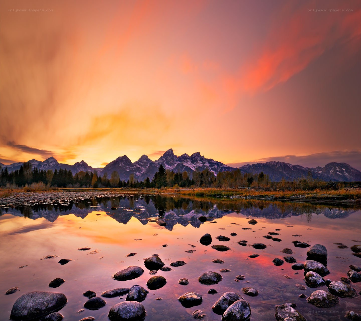 Sunset over mountain reflection