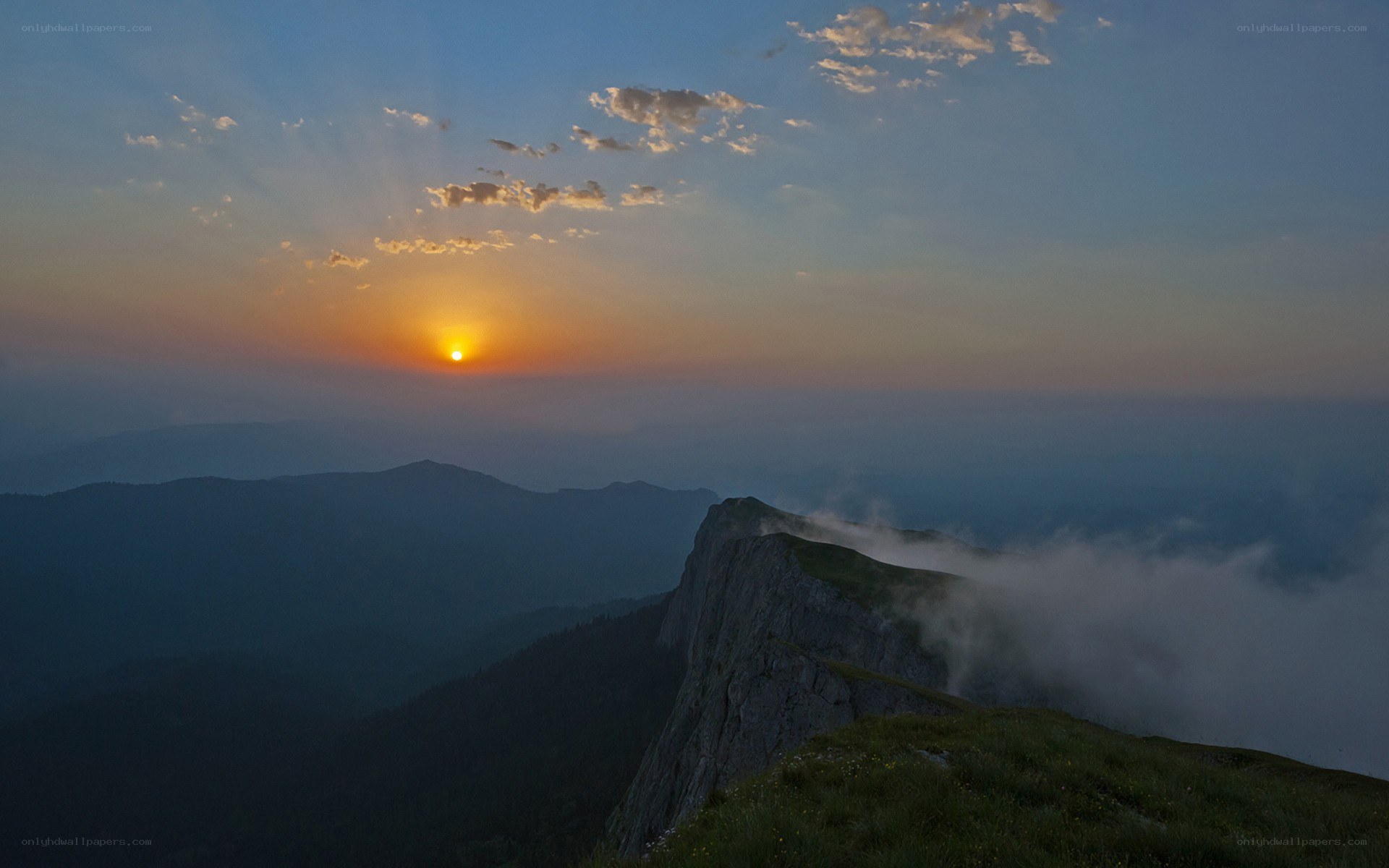 Sunset over mountain ridge