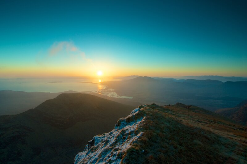 Sunset over mountain ridge