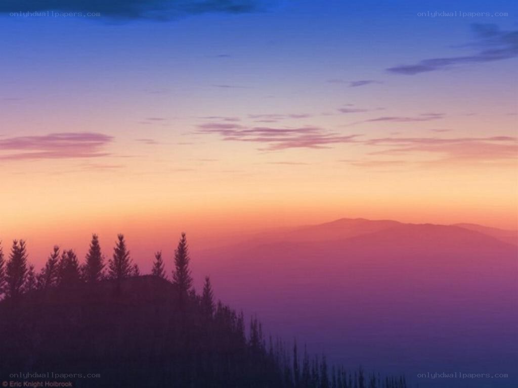 Sunset over mountain ridges