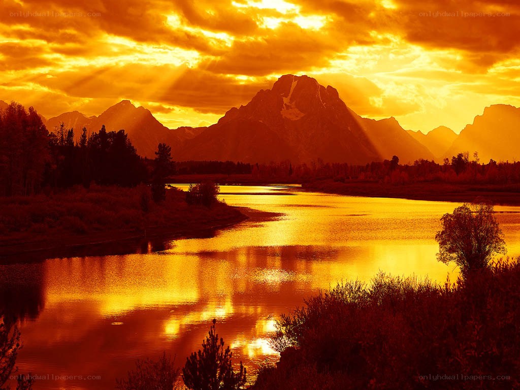 Sunset over mountain river