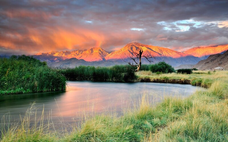 Sunset over mountain river