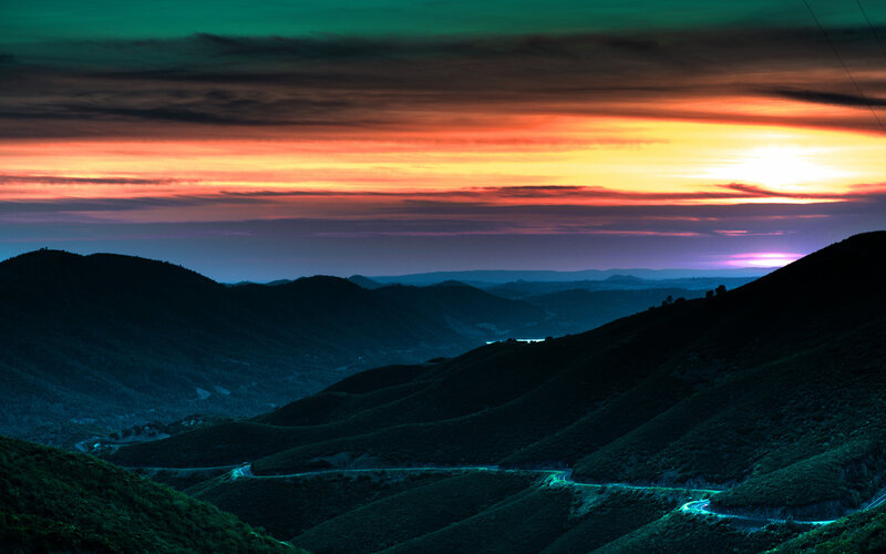 Sunset over mountain roads