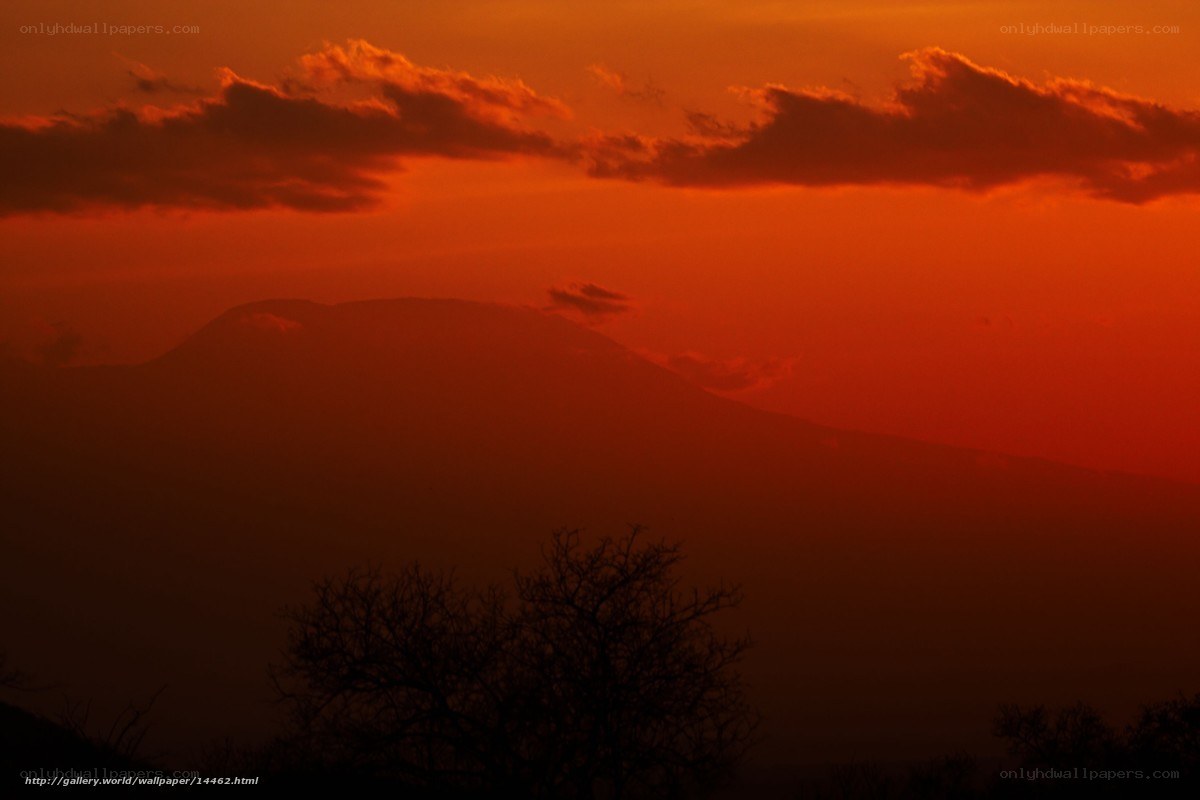 Sunset over mountain silhouette