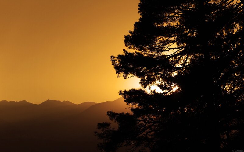 Sunset over mountain silhouettes