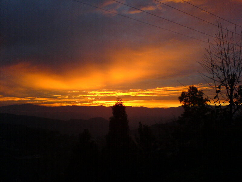 Sunset over mountain silhouettes