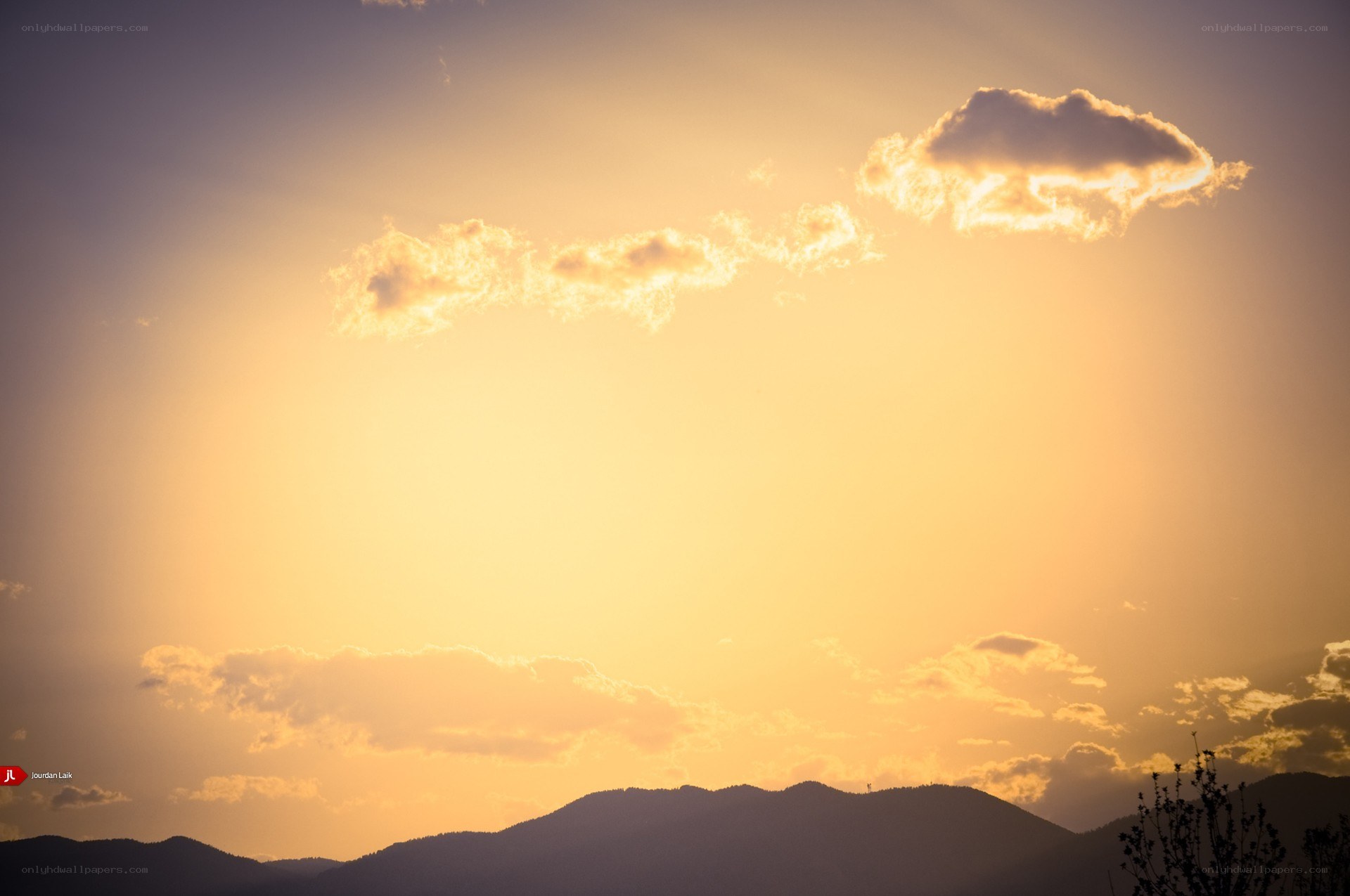 Sunset over mountain silhouettes