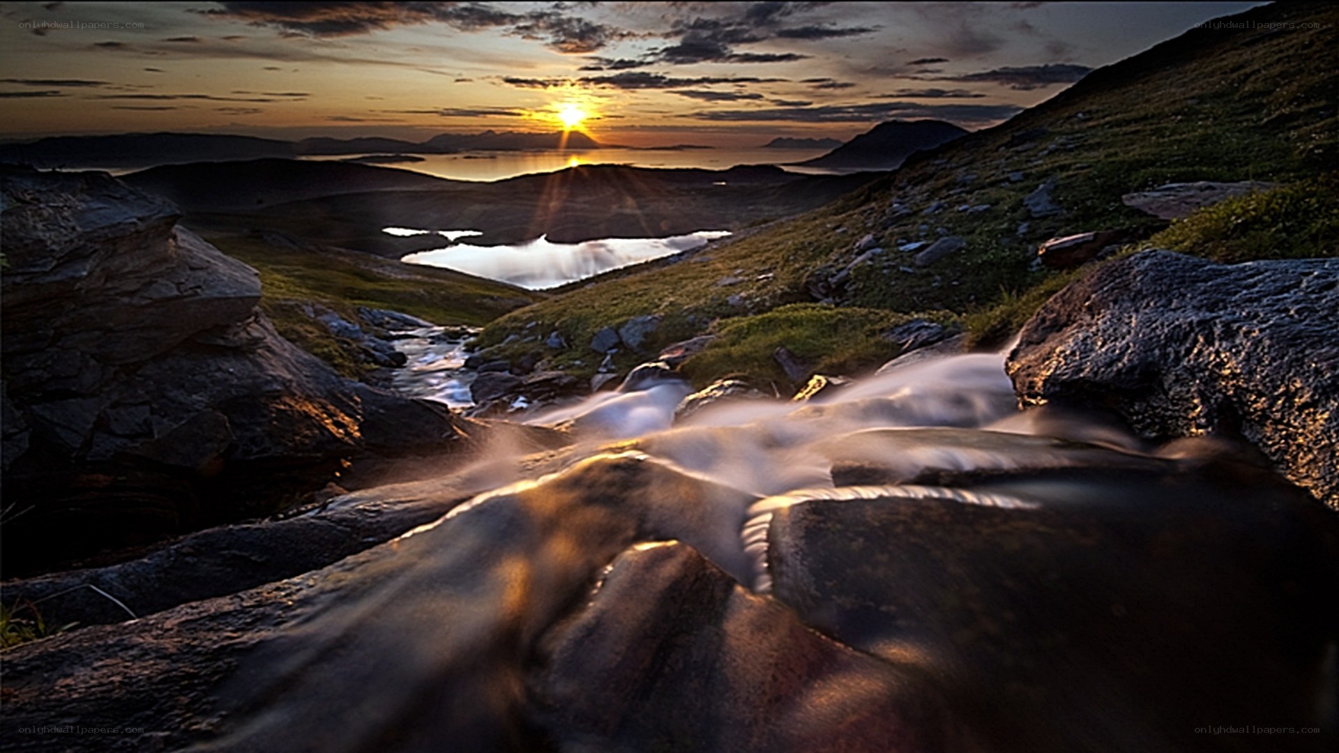 Sunset over mountain stream