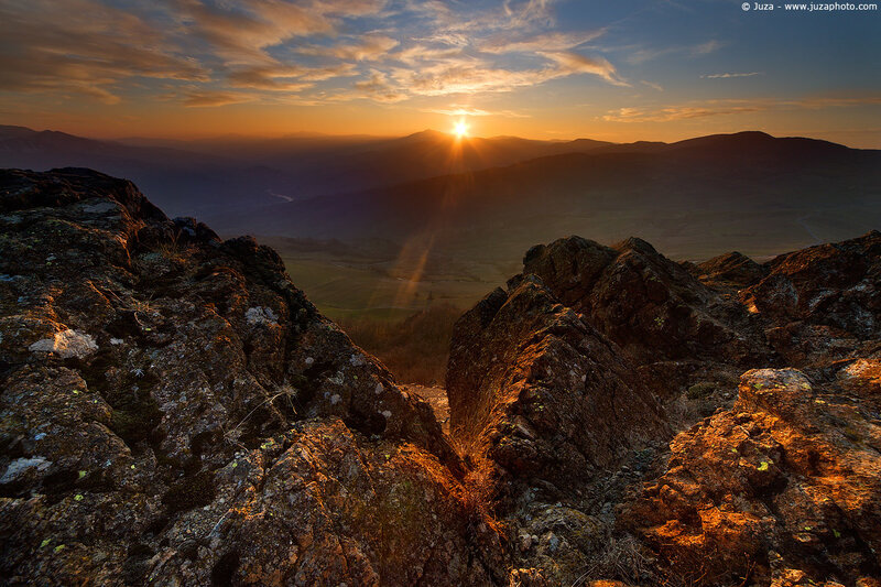 Sunset over mountain valley