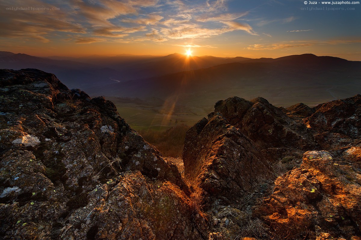 Sunset over mountain valley
