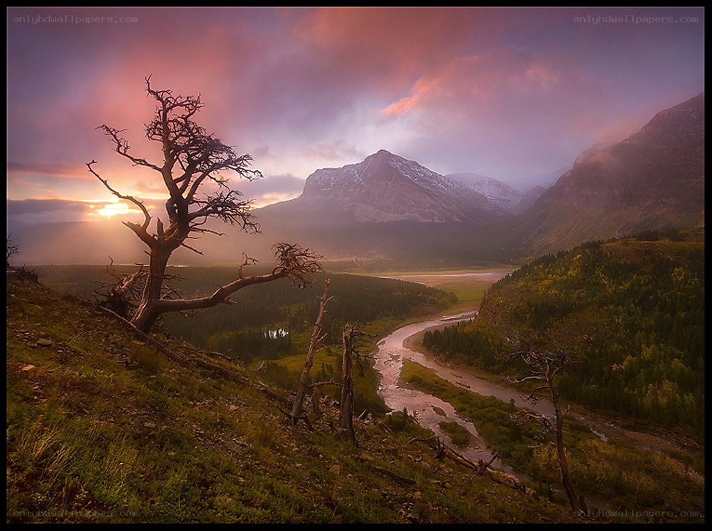 Sunset over mountain valley