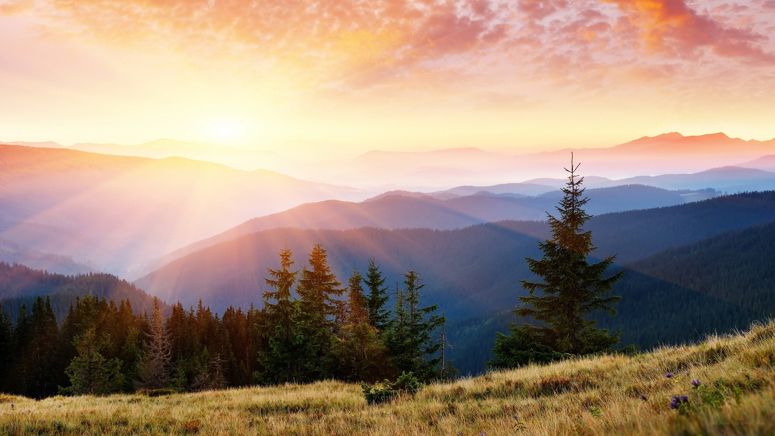Sunset over mountain valleys