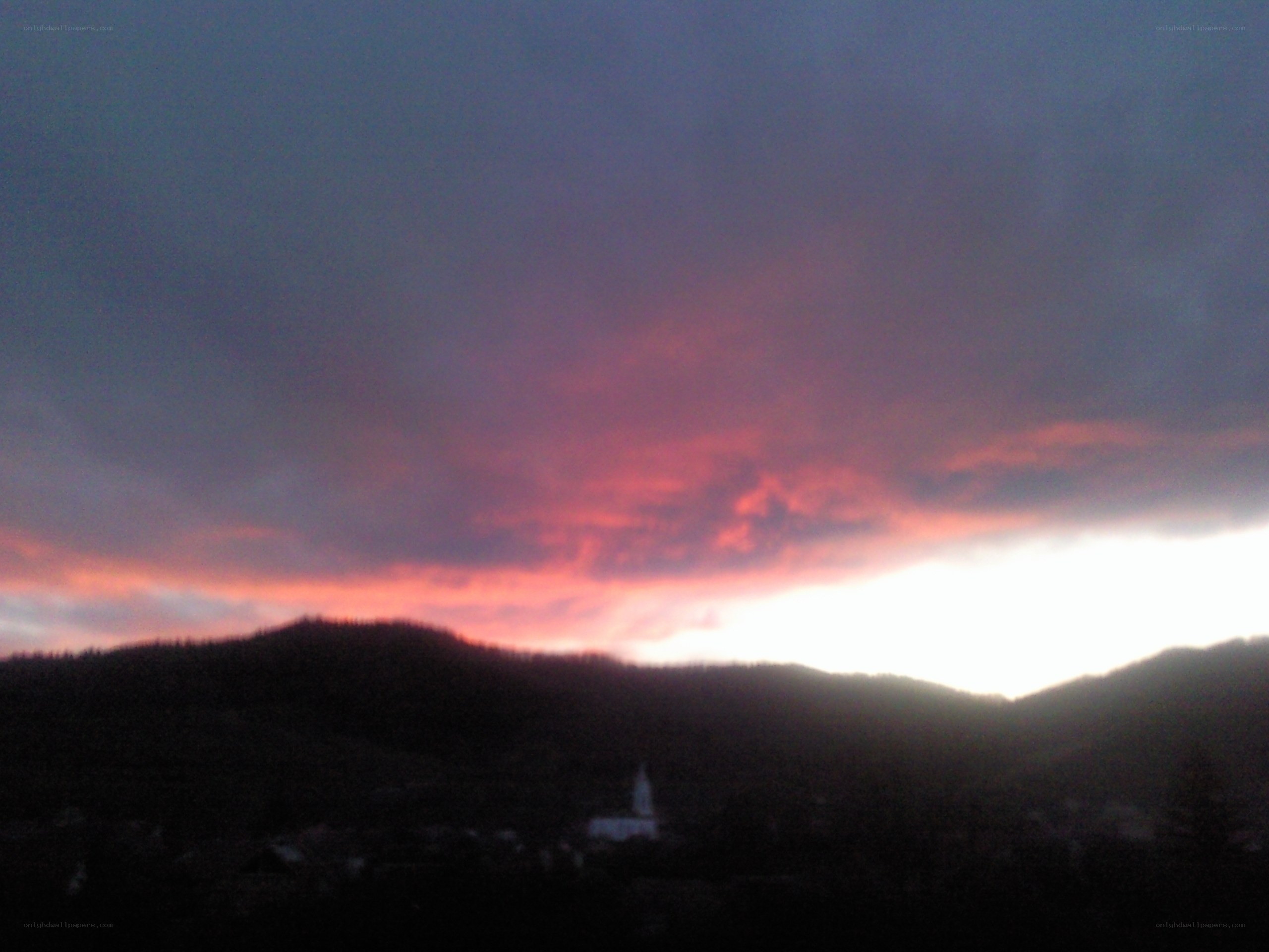 sunset over mountain village