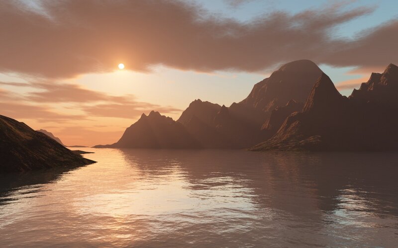 sunset over mountainous lake