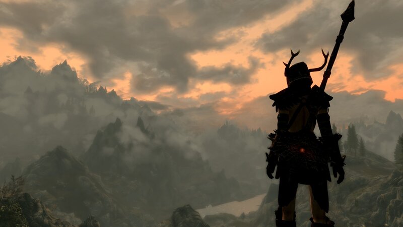 sunset over mountainous landscape