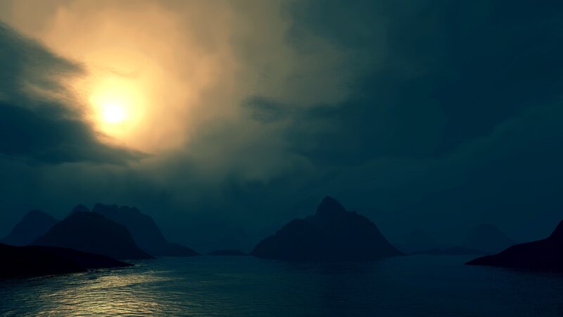 Sunset over mountainous sea