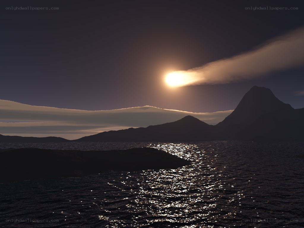 Sunset over mountainous sea