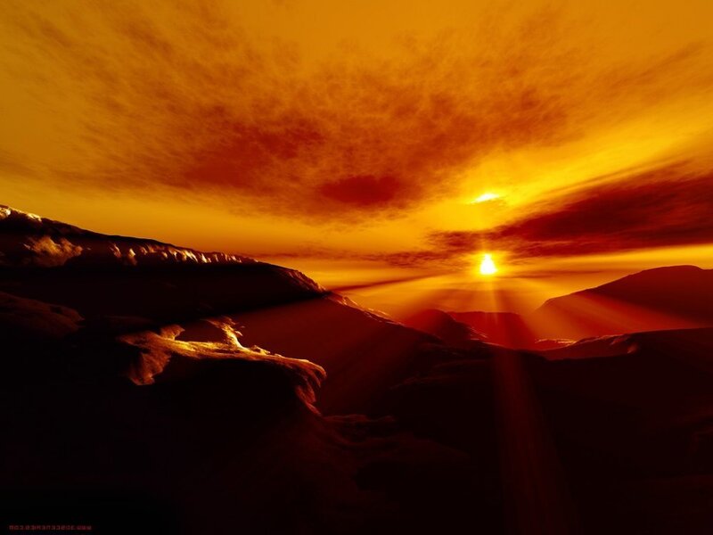 Sunset over mountainous terrain