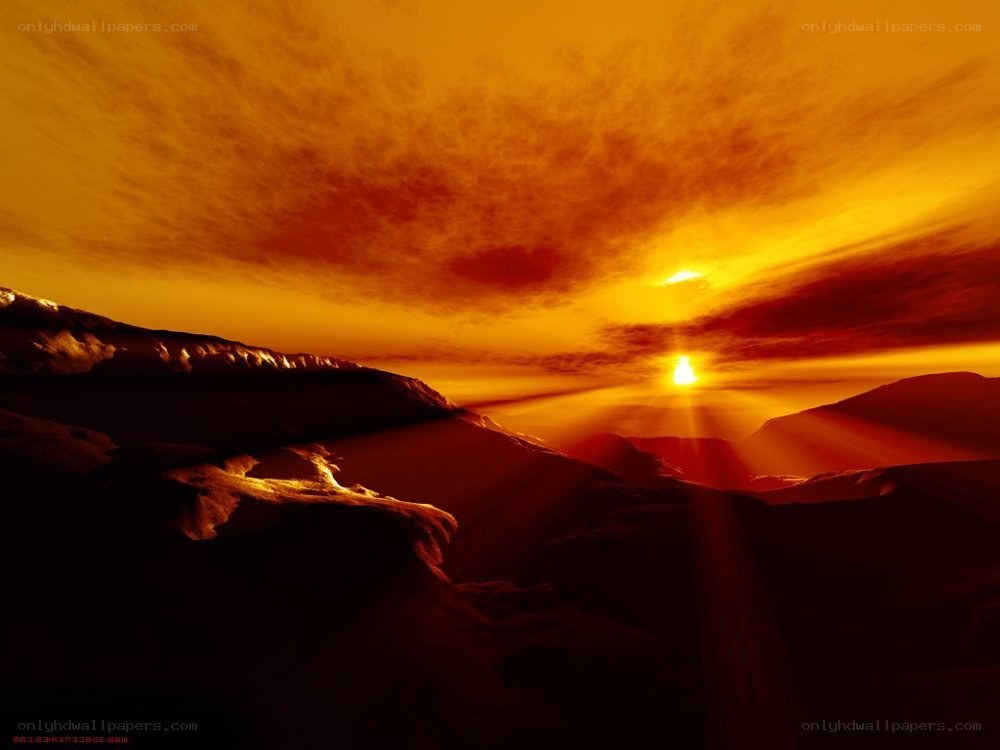 Sunset over mountainous terrain