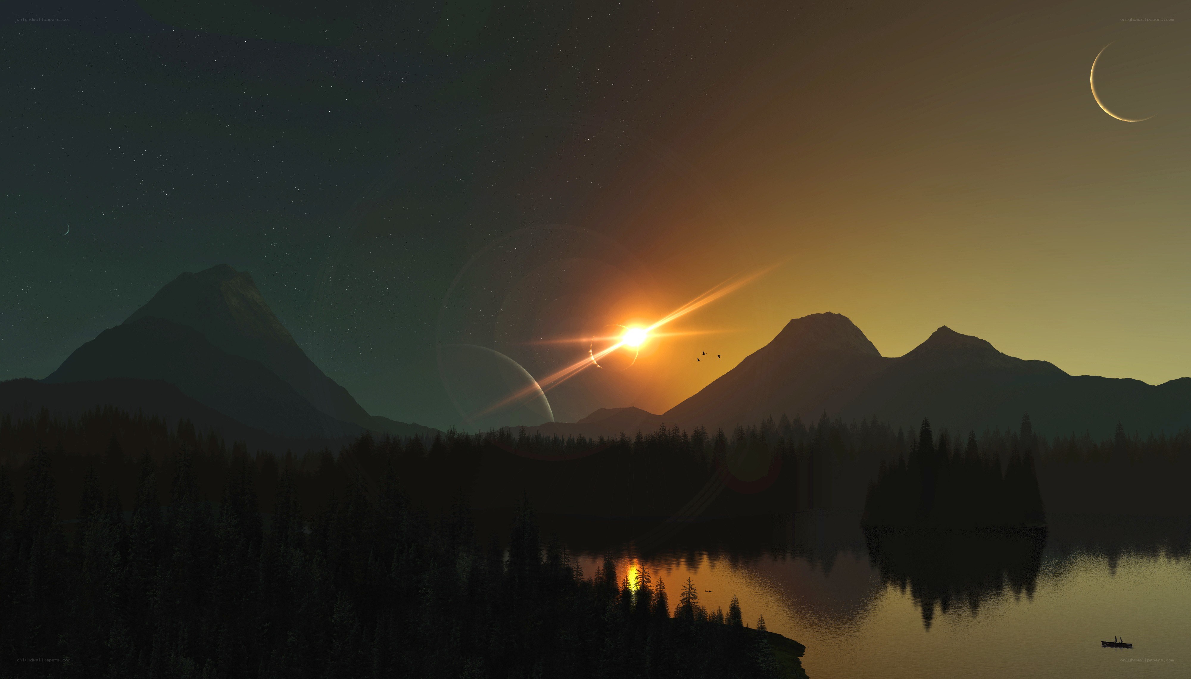 sunset over mountains and lake