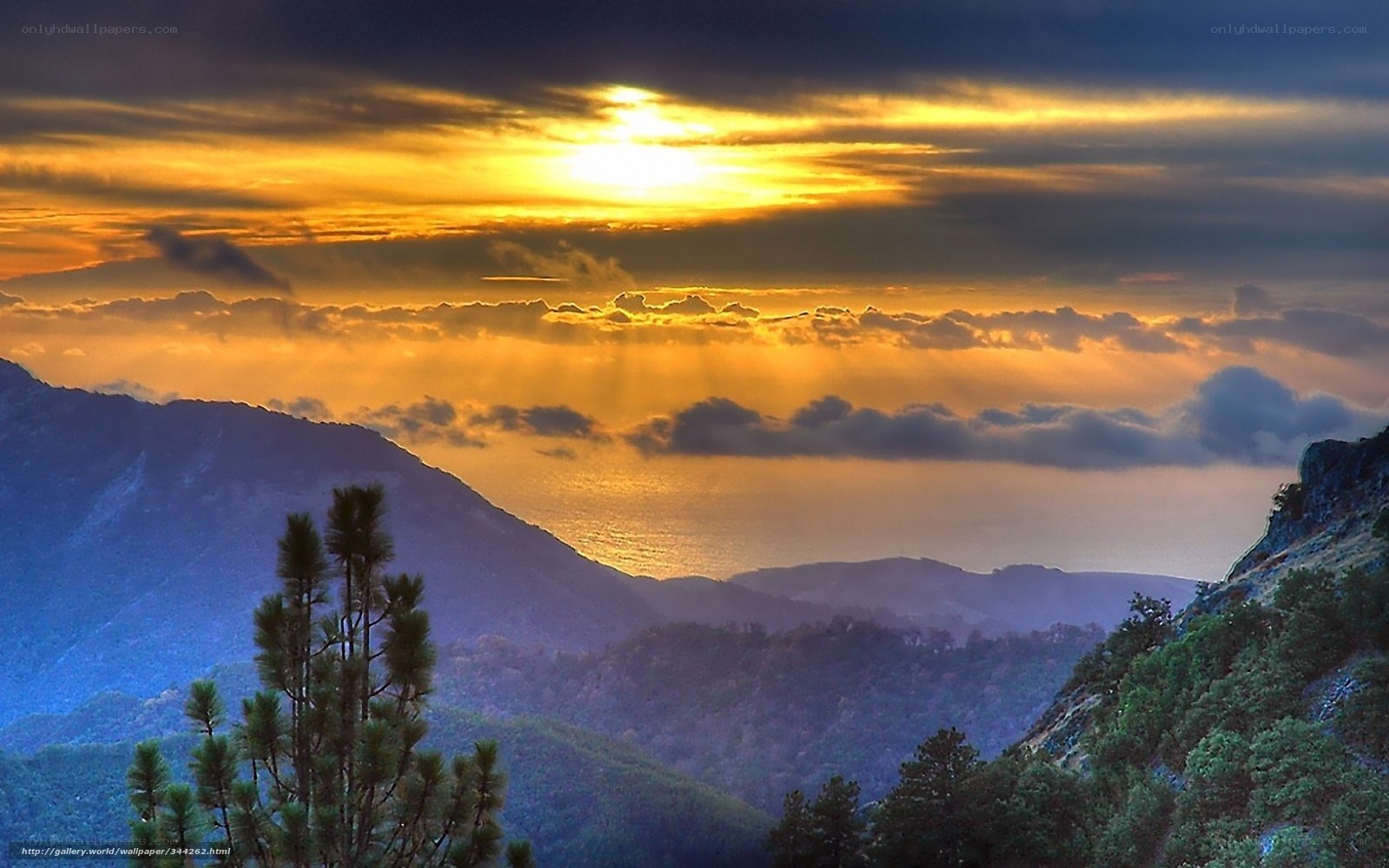 Sunset over mountains and sea