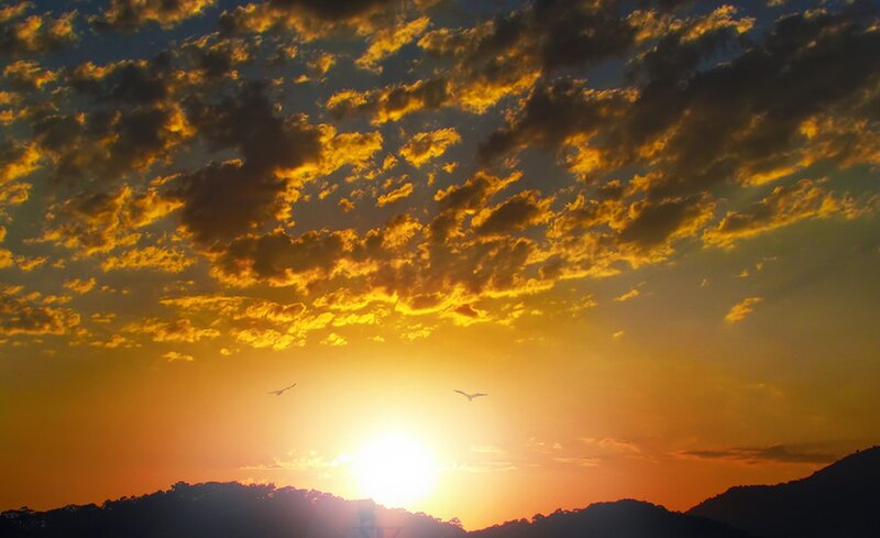 Sunset over Mountains — Orange, Dramatic, Photograph, Clouds, Birds