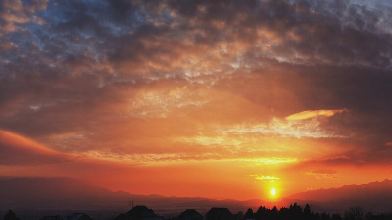 Sunset over Mountains — Orange, Dramatic, Photograph, Clouds, Houses