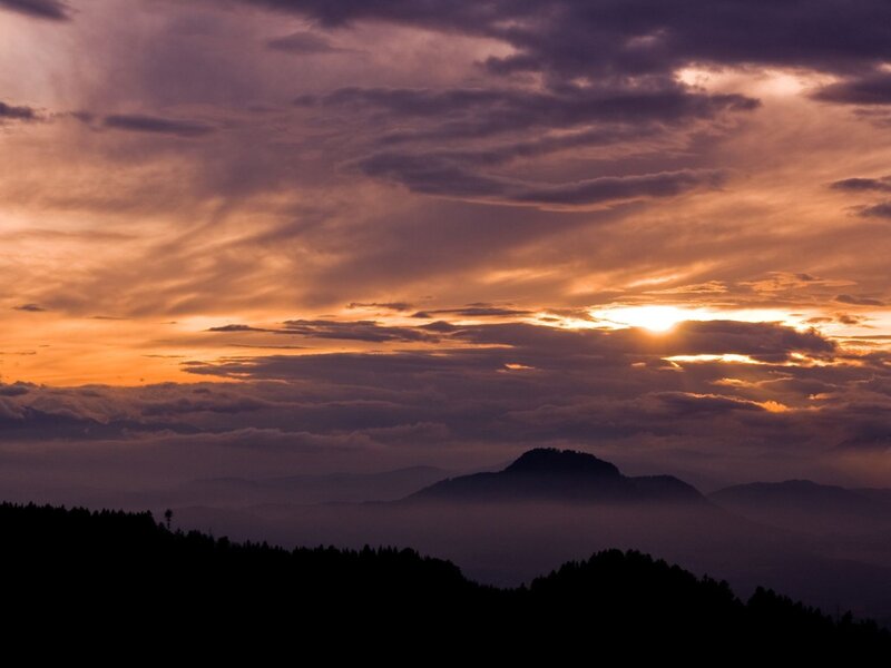 Sunset over Mountains — Orange, Dramatic, Photograph, Clouds, Sun, Purple, Black
