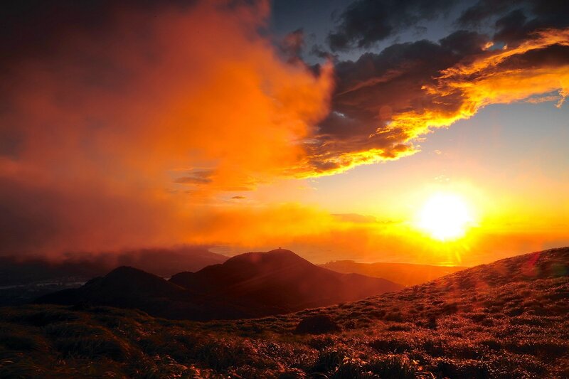 Sunset over Mountains — Orange, Dramatic, Photograph, Clouds, Sun, Yellow, Dark Blue